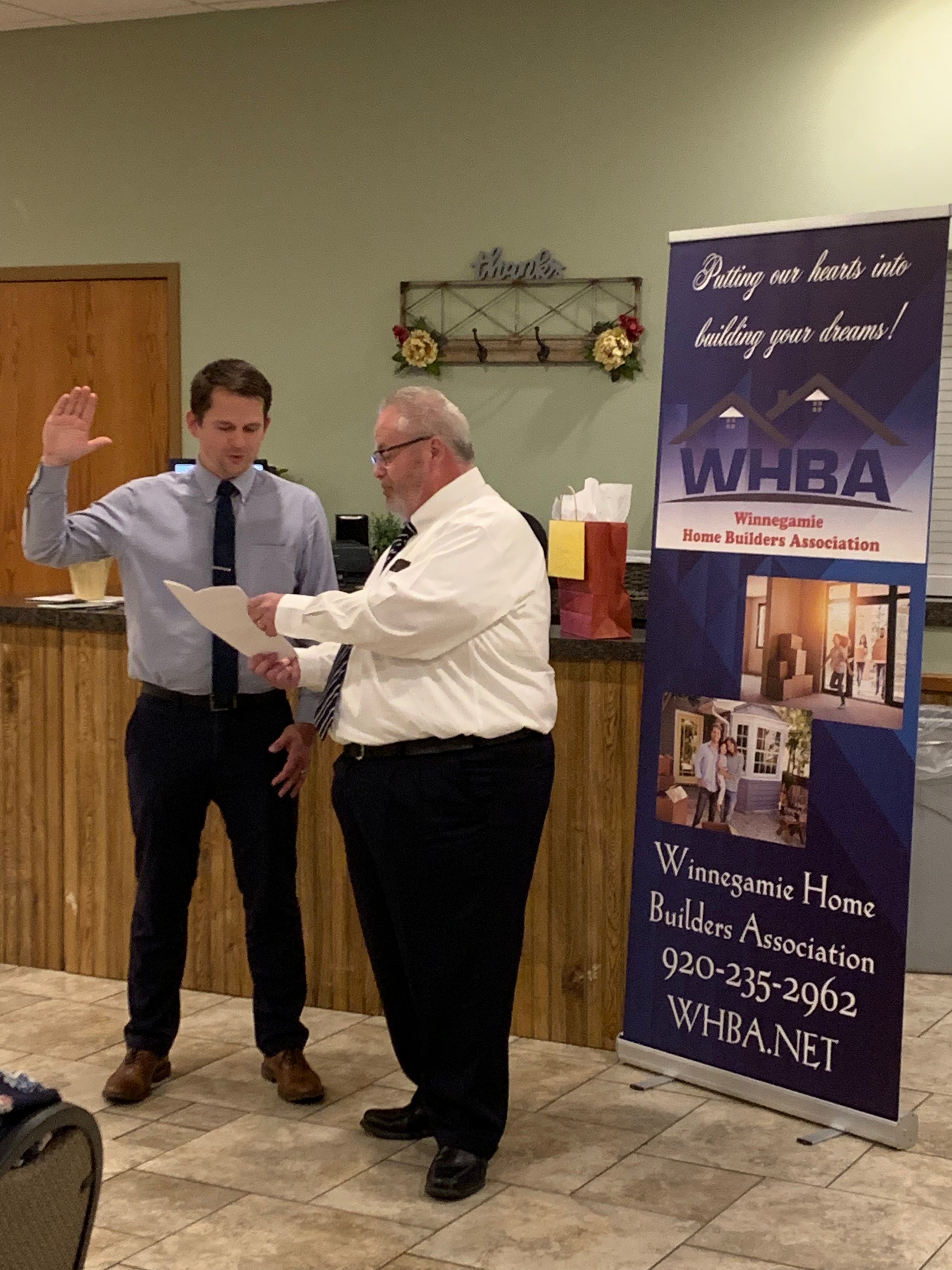 Greg Drusch being installed as WHBA President